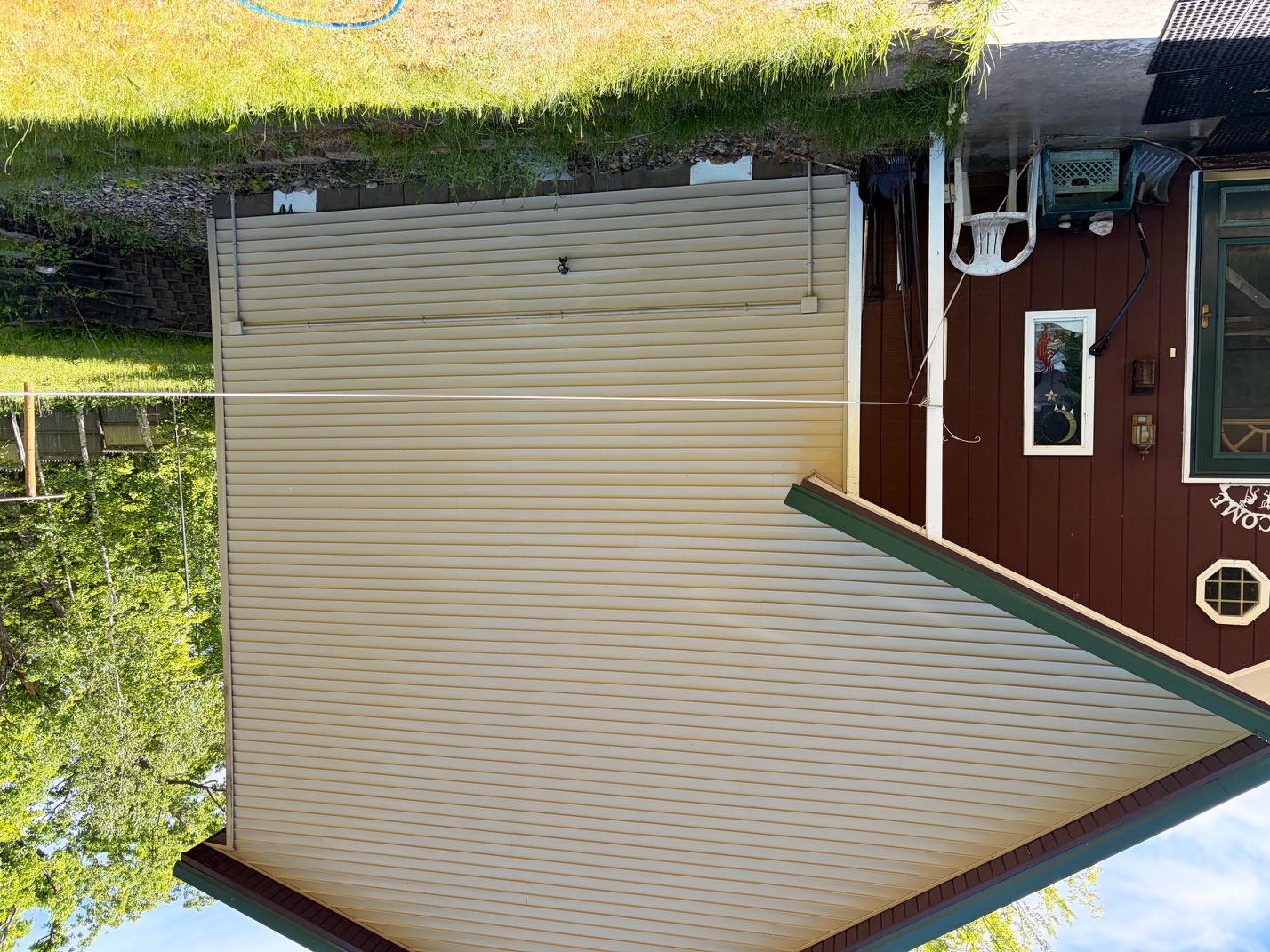 Clean house siding after Lynex